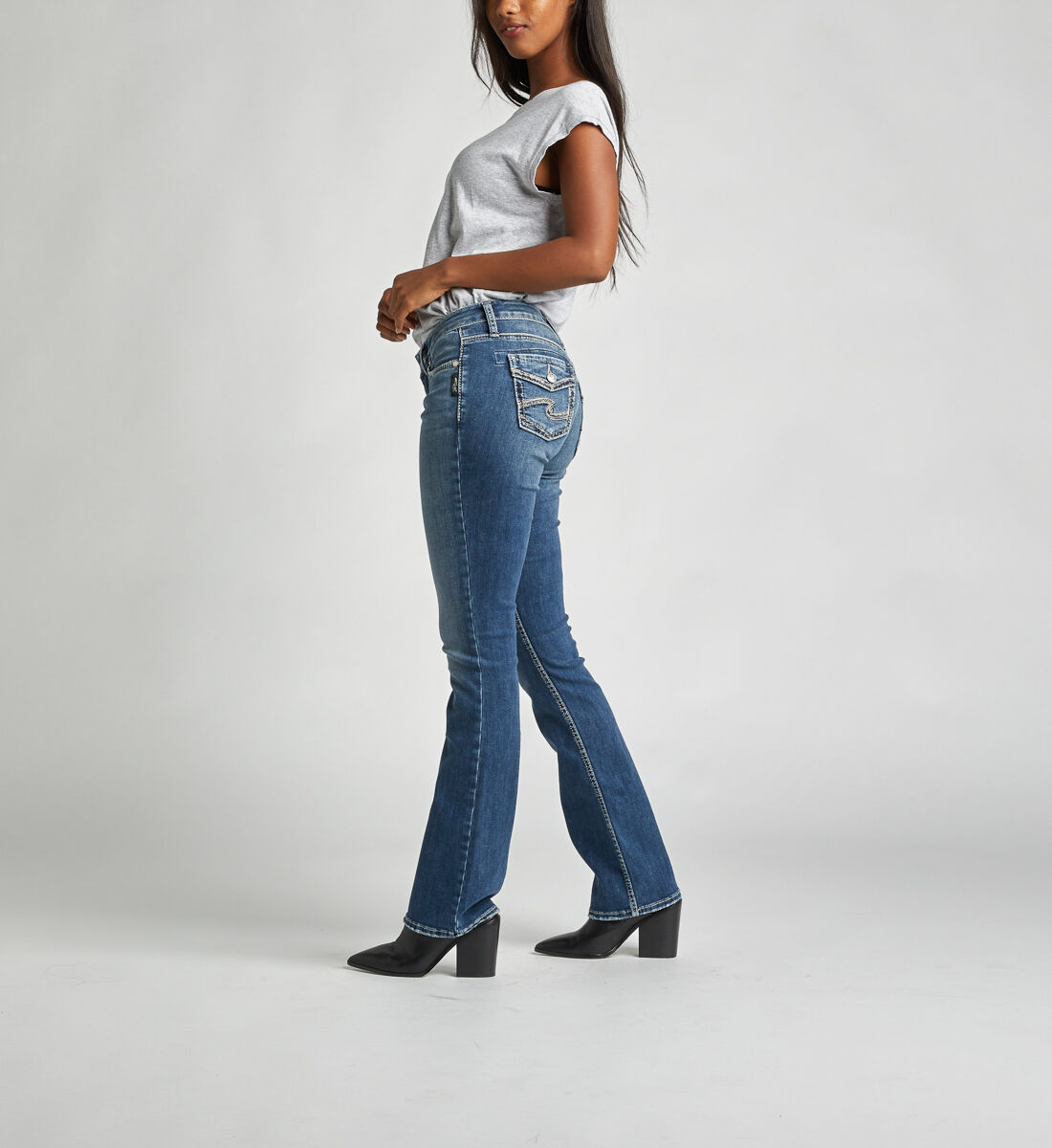 Buy Suki Mid Rise Curvy Slim Bootcut Jeans for USD 89.00 Silver Jeans US New