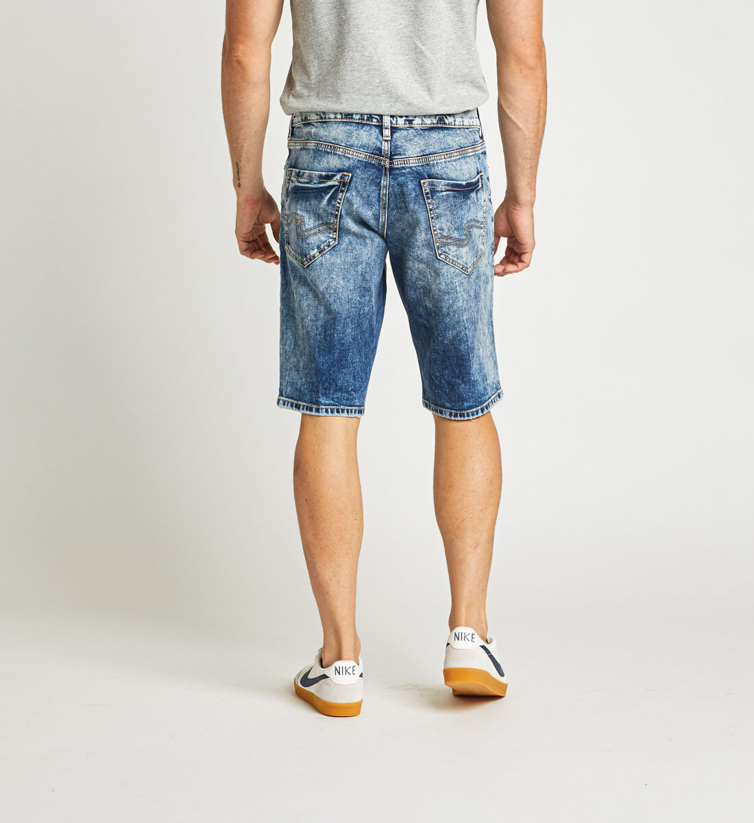 Nike shop silver jeans