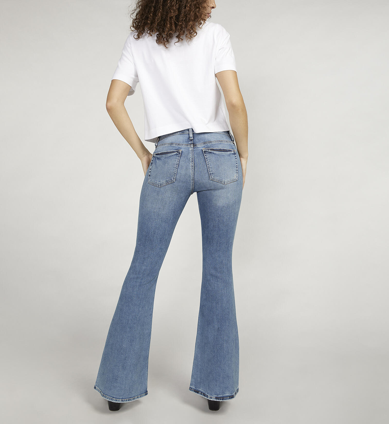 Buy Suki Mid Rise Flare Leg Jeans for USD 84.00