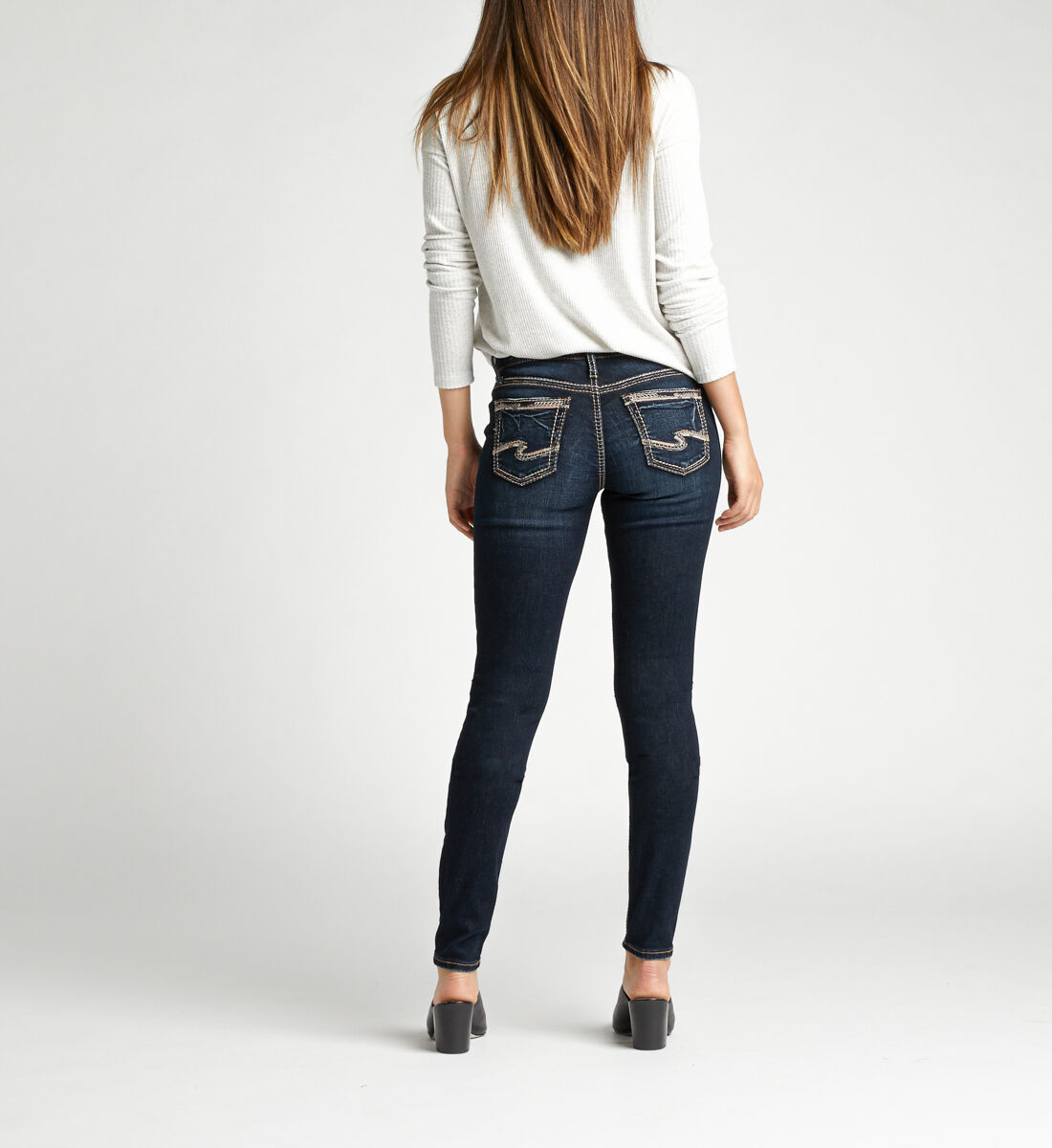 Suki Mid Rise Skinny Jeans Back