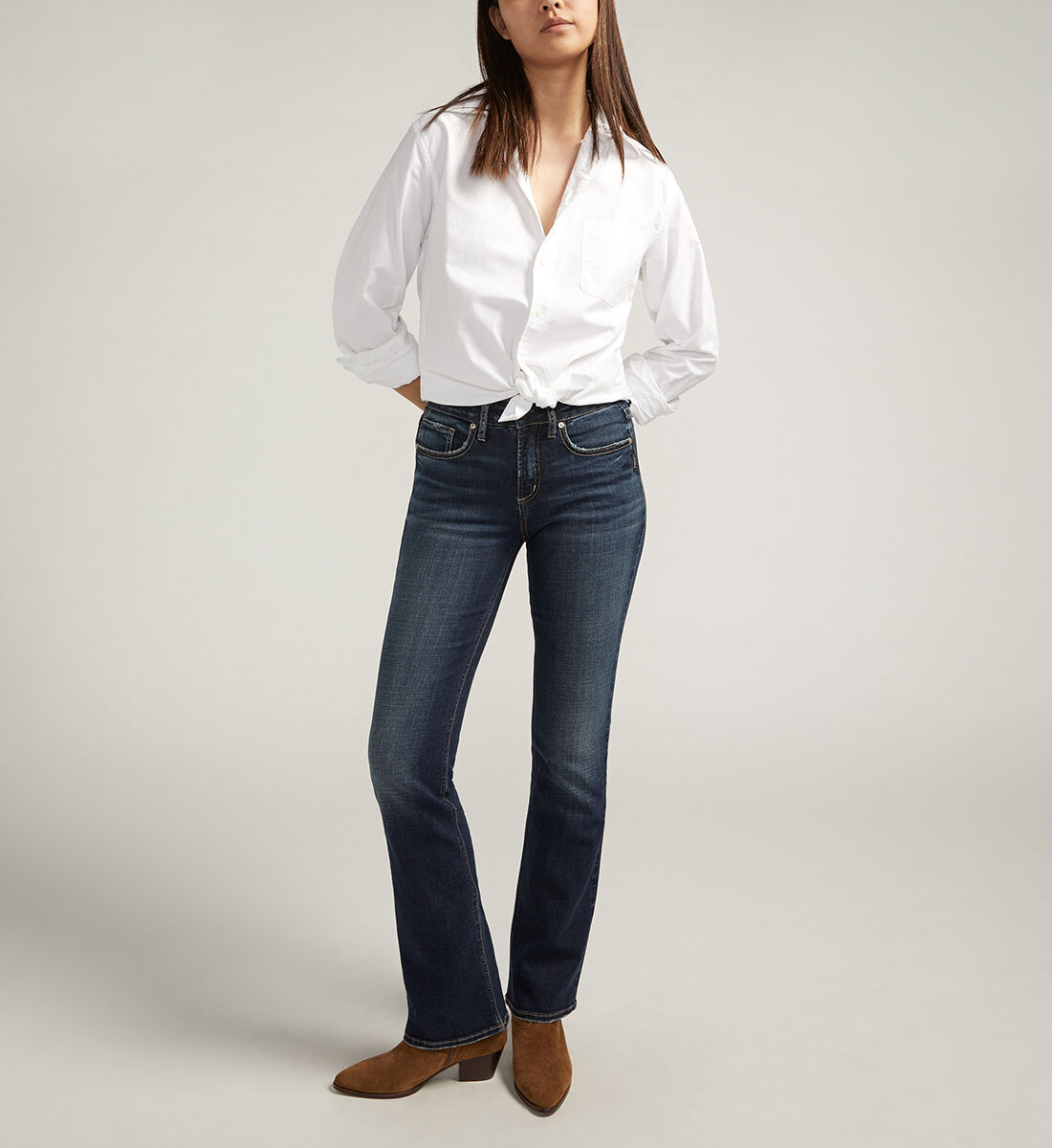 Buy Suki Mid Rise Slim Bootcut Luxe Stretch Jeans for USD 78.00 Silver Jeans US New