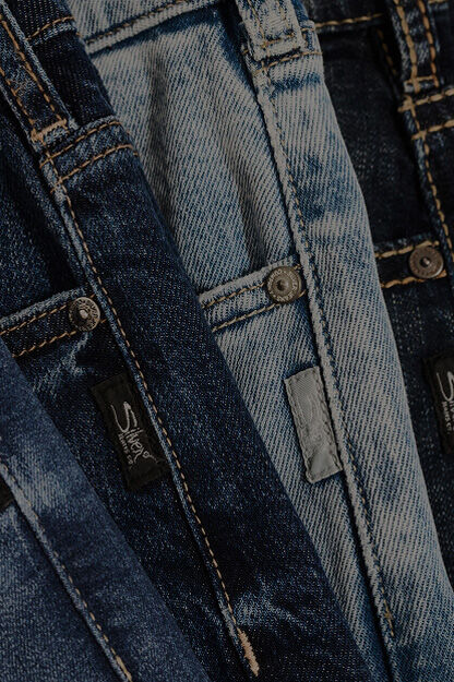 Buy Suki Mid Rise Slim Bootcut Luxe Stretch Jeans for USD 50.00