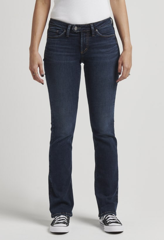 Women’s universally flattering slim bootcut jeans featuring a low rise and medium indigo wash
