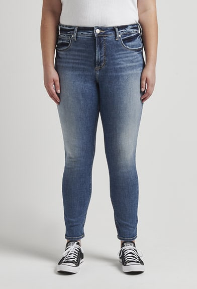 Plus size curvy fit straight leg jeans featuring a high rise and dark indigo wash
