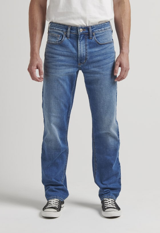 Men’s relaxed fit tapered leg jeans with a medium indigo wash