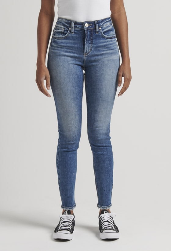 Women’s curvy fit slim bootcut jeans featuring a high rise and dark indigo rinse