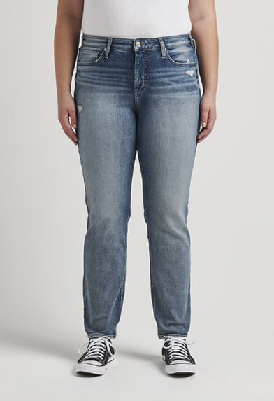Plus size mid rise skinny jeans in white featuring a universally flattering fit